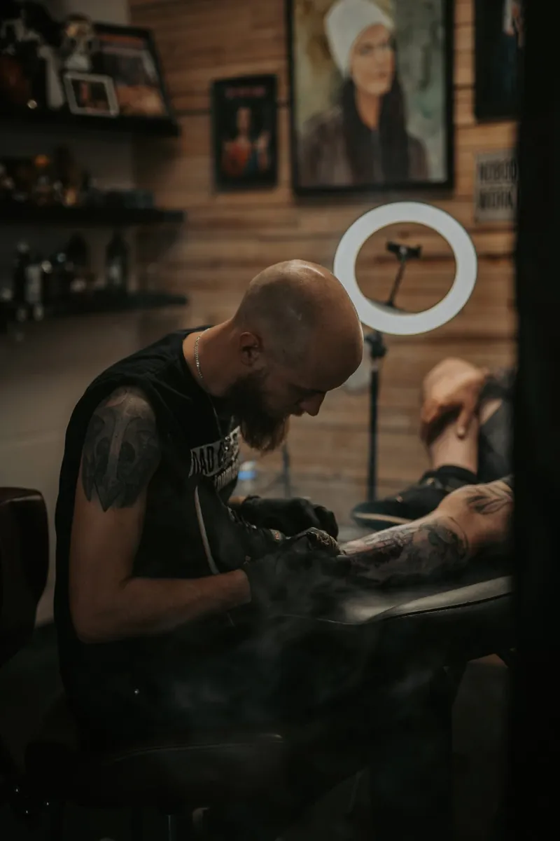 Tattoo artist at Sangoma Ink Tattoo Studio in Peterborough, photographed by Lasma Lagzdina